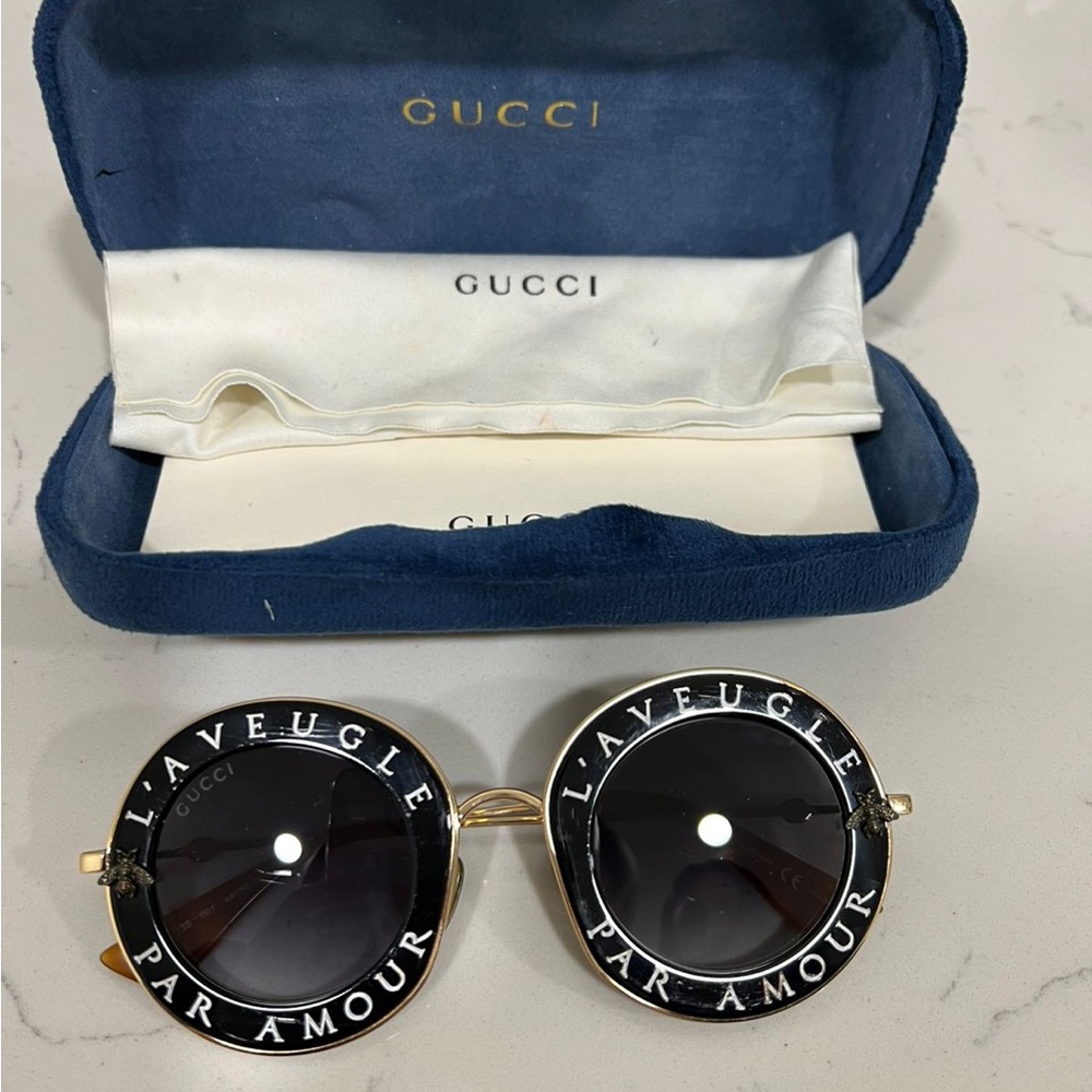 Gucci Black and Gold Round Sunglasses